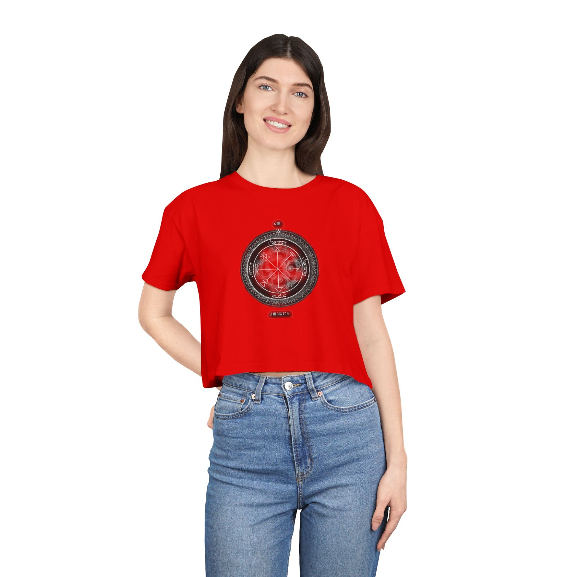 Model wearing wealth-attracting crop top with sacred Jupiter symbol